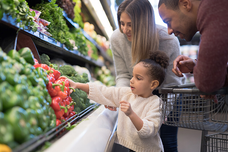 Family shopping in supermarket